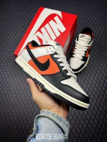 公司级Nike Dunk Low 橙黑 此款以简约大方的造型设计，给人以随性休闲的时尚格调，穿着舒适轻便，运动灵活自如，满足日常个性穿搭。 货号：HQ4988-