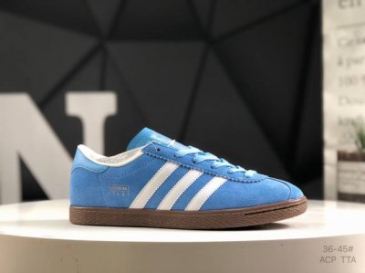 阿迪达斯 Adidas Stadt经典麂皮薄底运动板鞋 T头鞋 皮革和绒面革经典运动鞋以典藏足球鞋为灵感这款Stadt经典运动鞋植根足球传统，以别致皮革鞋面和绒