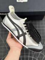 公司级onitsuka Tiger Mexico 66 阿斯克斯 鬼冢虎 低帮减震支撑低帮运动休闲鞋 这款鞋由皮革制成，具有鞋跟交叉加固设计，可提供更高的稳定性