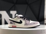 310 公司级带半码Air Jordan 1 Low 此款主张打破传统的工业化流水线设计限制，以Made By Ideas的超级创意为理念，集结众多潮流设计师，
