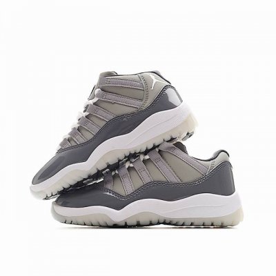 调价 中帮尺码：22-37 低帮尺码：22-37 经典Aj11重磅来袭，秒变潮搭佳选。采用系带鞋口设计，营造出众感受，赋予小宝贝专业运动员风范。焕新演绎经典人气