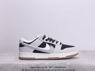 Nike Dunk Low Se “85” 双勾 Nike推出特别版dunk Low企划。此款nike Dunk Low采用灰色面革材质，鞋身左右侧均配有皮革质