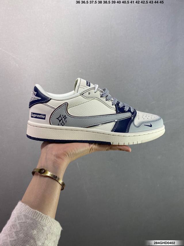 公司级Supreme X Air Jordan 1 Low 双拼灰星星 此款主张打破传统的工业化流水线设计限制，以Made By Ideas的超级创意为理念，集