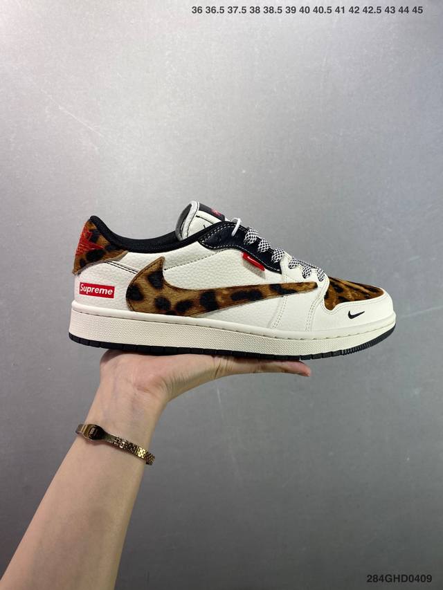 公司级Supreme X Air Jordan 1 豹纹 此款主张打破传统的工业化流水线设计限制，以Made By Ideas的超级创意为理念，集结众多潮流设计