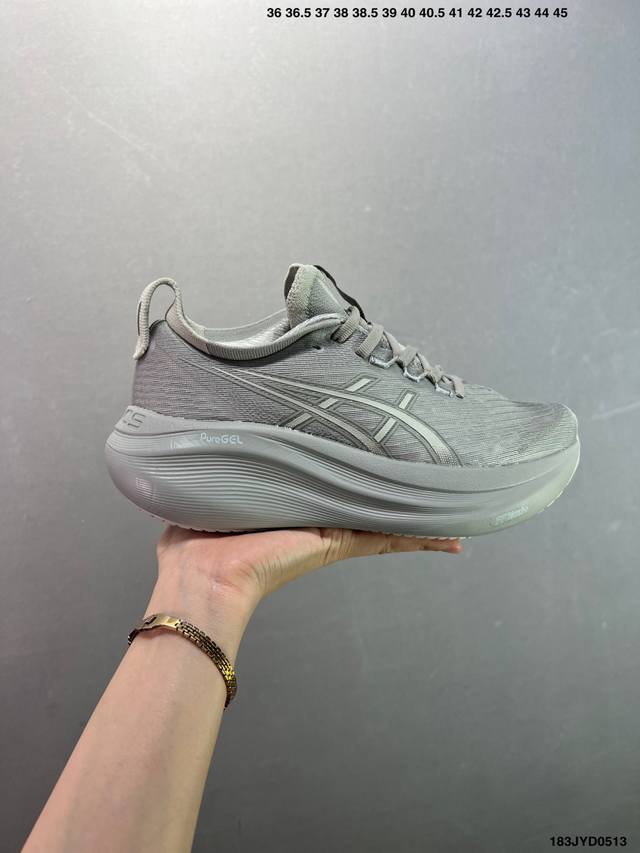 公司级Asics 亚瑟士Gel-Nimbus 27稳定跑鞋鞋面采用双层提花网面设计，提高包裹性和透气性，后跟搭载稳定系统科技T-Gel提升整体支撑力和结构感，减