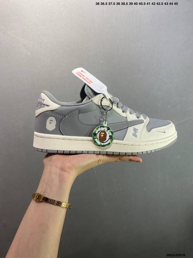 公司级Bape X Air Jordan 1 Low 茶褐 此款主张打破传统的工业化流水线设计限制 以Made By Ideas的超级创意为理念 集结众多潮流设