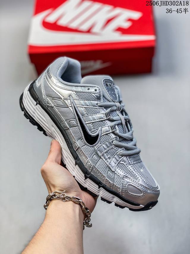 公司级耐克Nike P-6000 跑鞋内外侧都用了红色的钩子，采用透气材料，搭配匠心覆面，再现千禧年代的跑鞋风格，塑就大气外观。鞋款秉承 Nike Pegasu