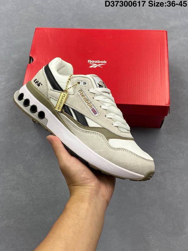 公司级Reebok锐步Ers World 新款复古跑步鞋男士运动鞋透气舒适时尚休闲训练鞋 Ers World 是跑步鞋的深度剪裁，采用现代风格重新打造。镶板设计