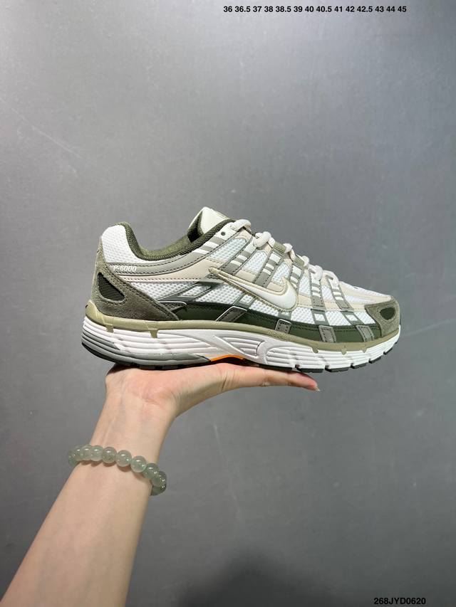公司级耐克Nike P-6000 跑鞋内外侧都用了红色的钩子，采用透气材料，搭配匠心覆面，再现千禧年代的跑鞋风格，塑就大气外观。鞋款秉承 Nike Pegasu