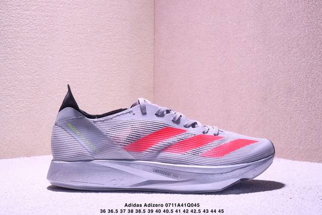 公司级阿迪达斯Adidas Adizero Takumi Sen 10 M耐磨减震专业跑步鞋 男款 北京马拉松40周年限定。冲向目标，一路向前，不断挑战和突破自