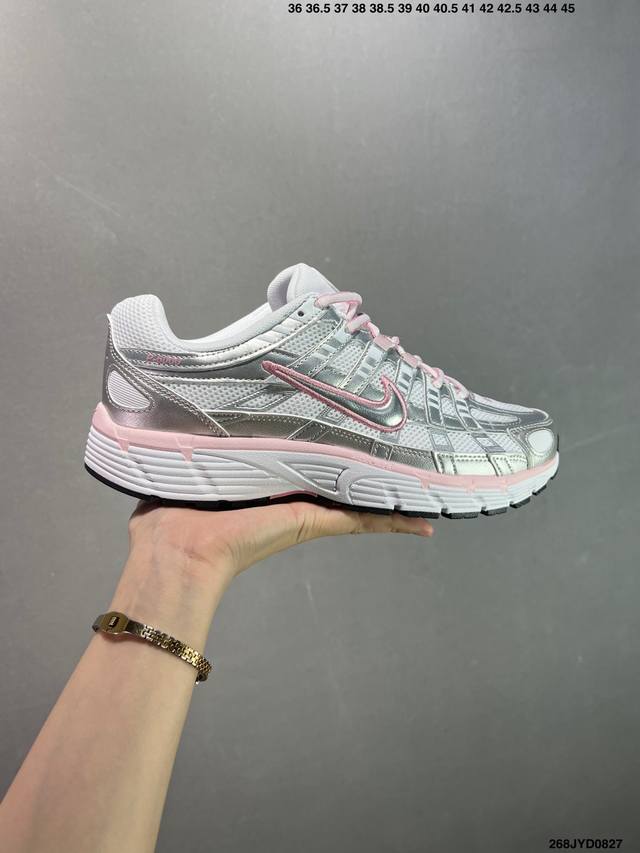公司级耐克Nike P-6000 跑鞋内外侧都用了红色的钩子，采用透气材料，搭配匠心覆面，再现千禧年代的跑鞋风格，塑就大气外观。鞋款秉承 Nike Pegasu