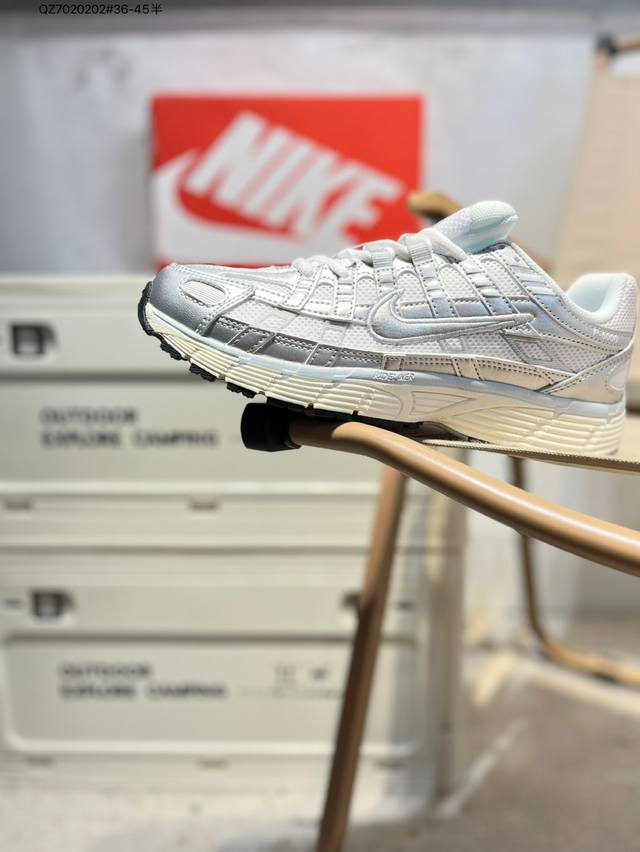 耐克 Nike P-6000 Laser Blue 复古科技个性运动老爹鞋。该鞋款鞋面采用纵横交错的覆面，重现 2000 年代跑鞋风格，同时搭配缓震鞋垫，带来舒