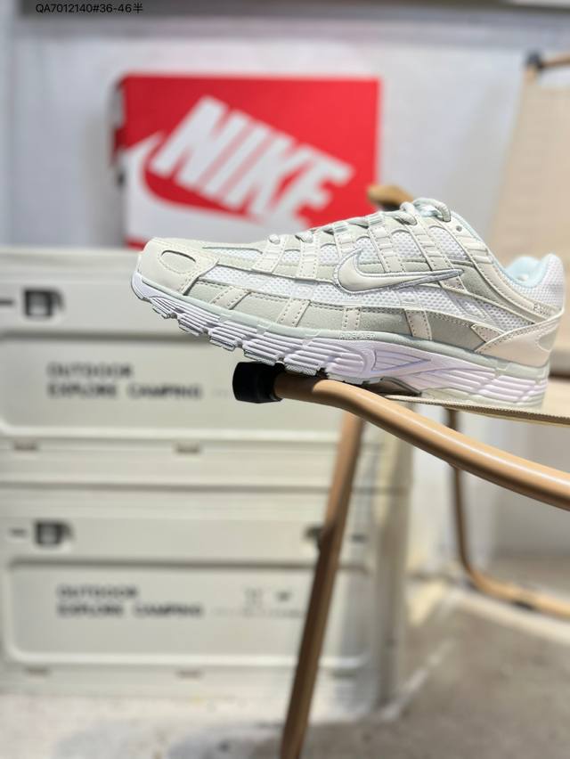 耐克 Nike P-6000 Laser Blue 复古科技个性运动老爹鞋。该鞋款鞋面采用纵横交错的覆面，重现 2000 年代跑鞋风格，同时搭配缓震鞋垫，带来舒