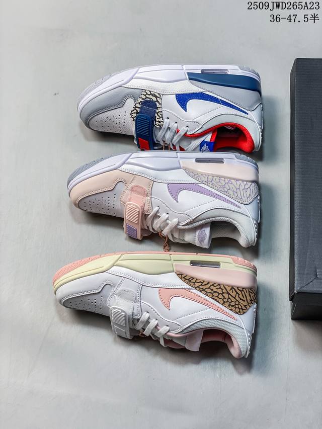 真标带半码 Air Jordan Legacy Aj312 低帮 鞋身采用了皮革材质打造 横跨鞋面的魔术贴十分吸睛 侧面的Swoosh Logo的一部分被鞋面遮