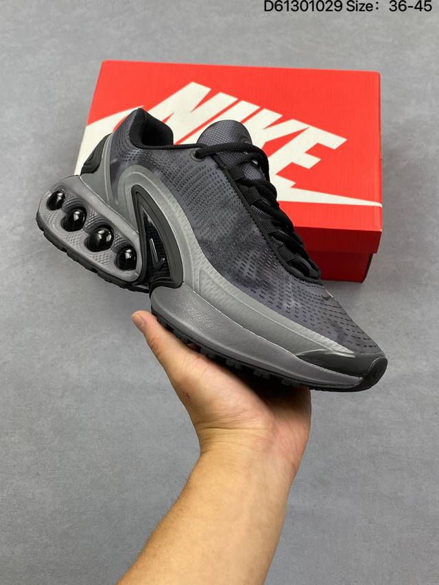 耐克 Nike Air Max Dn8 全掌气垫科技运动跑步鞋Fq7860-005。鞋款采用醒目渐变织物和动态波浪状结构鞋面，搭配黑色中底和外底，以及迷你黑色