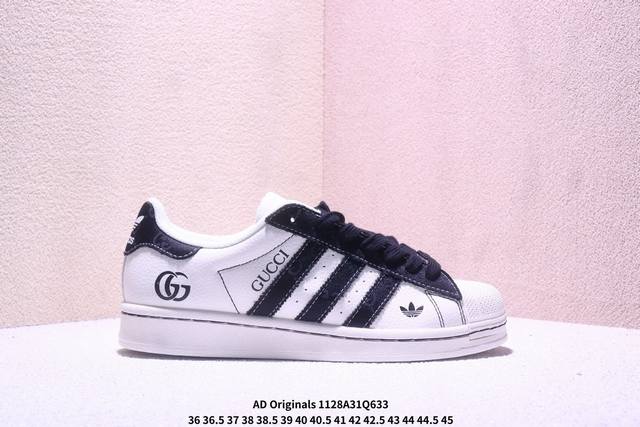 纯原 Clot X Ad Originals Superstar“金标” #贝壳头Lv联名限定 贴合柔软布料蓝彩印花配色 ，这双鞋的整体设计思路和风格可以说很C