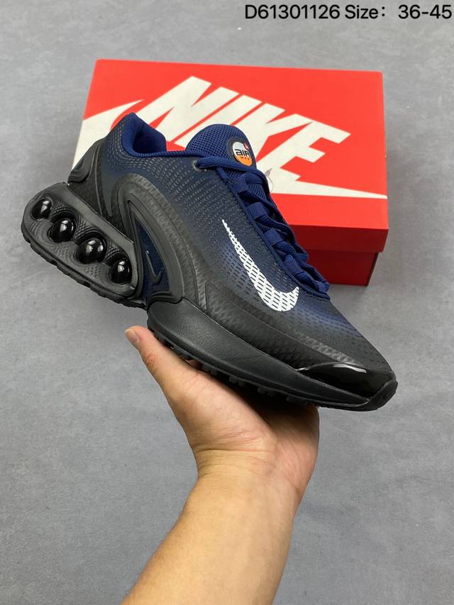公司级 全新Nike Air Max Dn 运动鞋 时尚跑步鞋，豆荚造型气垫吸睛！鞋面采用织物材质打造，提供舒适的穿着体验。这款鞋不仅具有时尚的外观，还融合了许