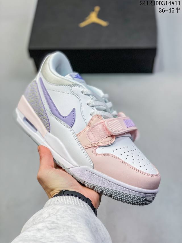 真标带半码air Jordan Legacy Aj312 低帮 鞋身采用了皮革材质打造 横跨鞋面的魔术贴十分吸睛 侧面的swoosh Logo的一部分被鞋面遮挡